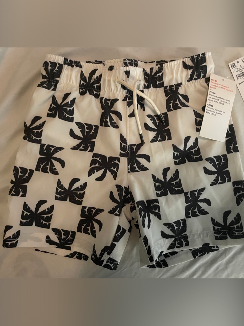 Old Navy White Swim Trunks with Black Palm Print